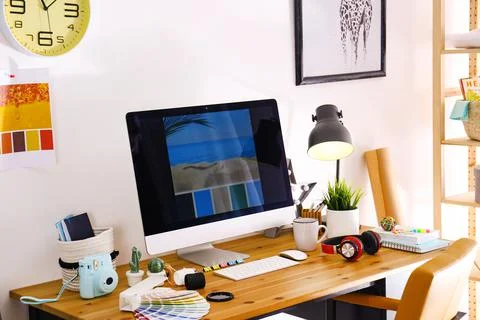 Comfortable designer's workplace with modern computer in studio Foto stock