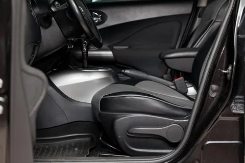 Comfortable front seats inside the car: the driver and passenger, tied with b Stock Photos