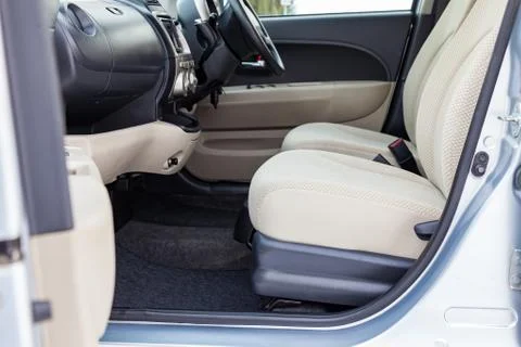 Comfortable front seats inside the car: the driver and passenger, tied with b Stock Photos