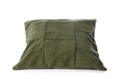 Comfortable green square pillow with patchwork design soft fabric texture and Stock Photos
