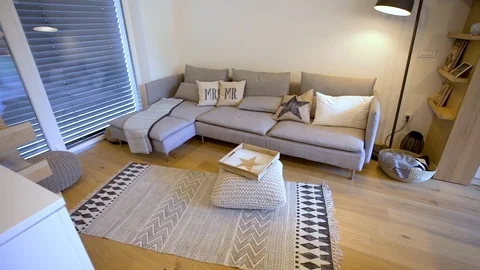 Comfortable home-made gray sofa   Stock Footage 111016903