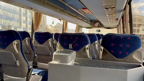 The Comfortable Interior Inside a Modern Bus Provides a Pleasant Experience for Stock Footage 303756640