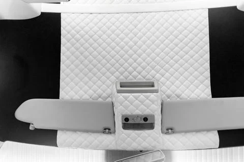 Comfortable interior of a passenger bus with soft seats Stock-Fotos