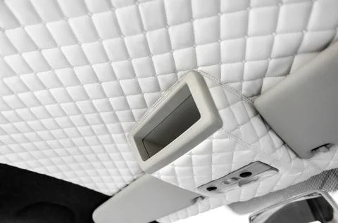 Comfortable interior of a passenger bus with soft seats Stock Photos