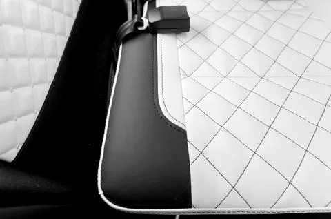 Comfortable interior of a passenger bus with soft seats Stock Photos