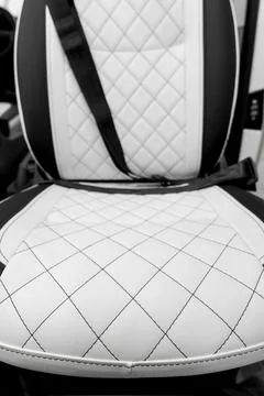 Comfortable interior of a passenger bus with soft seats Stock Photos