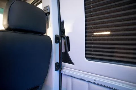 Comfortable interior of a passenger bus with soft seats Stock Photos