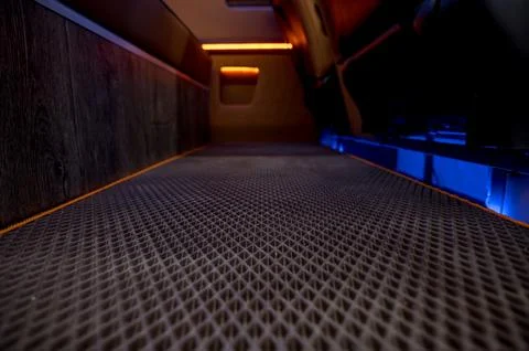 Comfortable interior of a passenger bus with soft seats Stock-Fotos