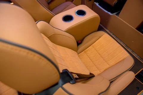 Comfortable interior of a passenger bus with soft seats Stock Photos