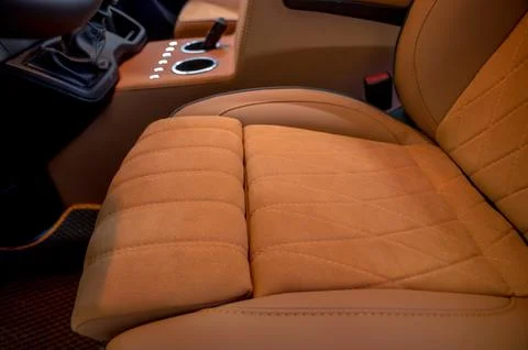 Comfortable interior of a passenger bus with soft seats Stock Photos