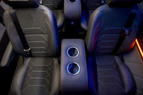 Comfortable interior of a passenger bus with soft seats Foto stock
