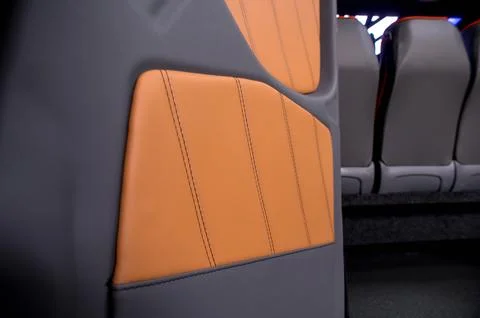 Comfortable interior of a passenger bus with soft seats Stock Photos