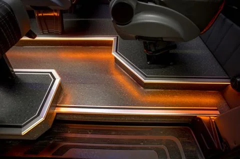 Comfortable interior of a passenger bus with soft seats Stock Photos