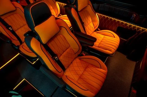 Comfortable interior of a passenger bus with soft seats Foto stock