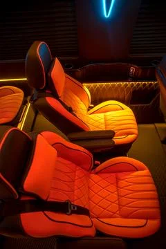 Comfortable interior of a passenger bus with soft seats Stock Photos