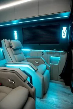 Comfortable interior of a passenger bus with soft seats 스톡 사진