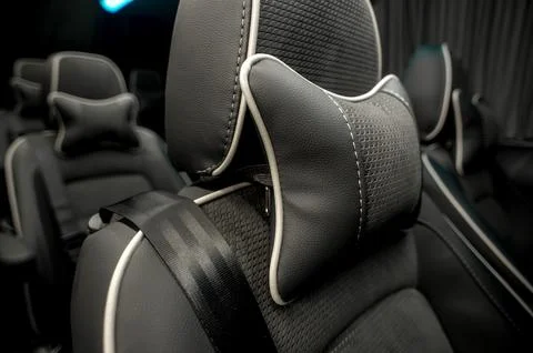 Comfortable interior of a passenger bus with soft seats Stock Photos
