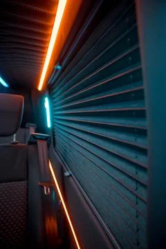 Comfortable interior of a passenger bus with soft seats Stock Photos