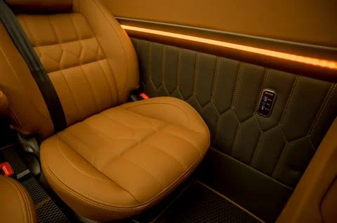 Comfortable interior of a passenger bus with soft seats Stock-Fotos