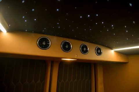 Comfortable interior of a passenger bus with soft seats Stock-Fotos