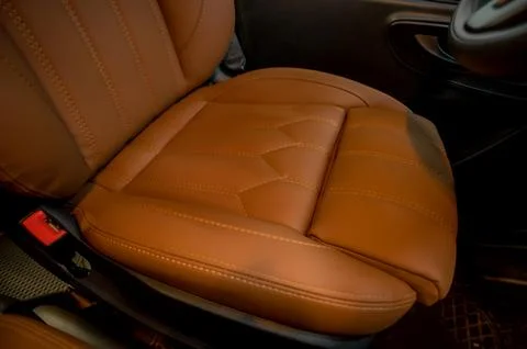 Comfortable interior of a passenger bus with soft seats Stock Photos