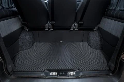 Comfortable interior of a passenger bus with soft seats Stock-Fotos