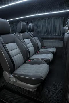 Comfortable interior of a passenger bus with soft seats Foto stock
