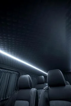 Comfortable interior of a passenger bus with soft seats 스톡 사진