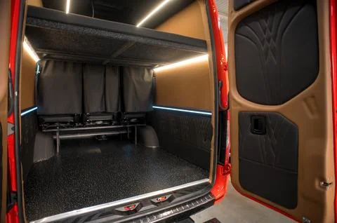Comfortable interior of a passenger bus with soft seats Stock-Fotos