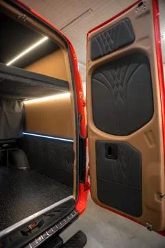 Comfortable interior of a passenger bus with soft seats Stock Photos