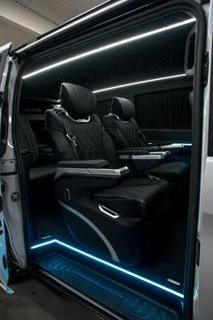 Comfortable interior of a passenger bus with soft seats Foto stock