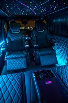 Comfortable interior of a passenger bus with soft seats Foto stock