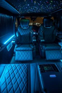 Comfortable interior of a passenger bus with soft seats 스톡 사진