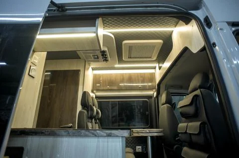 Comfortable interior of a passenger bus with soft seats Foto stock