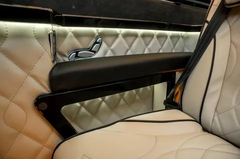 Comfortable interior of a passenger bus with soft seats Stock Photos