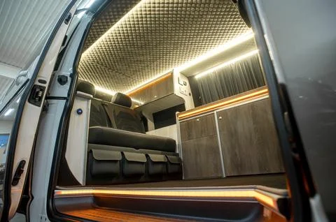 Comfortable interior of a passenger bus with soft seats 스톡 사진