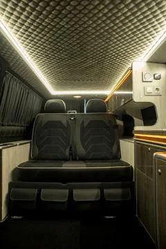 Comfortable interior of a passenger bus with soft seats Foto stock