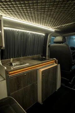 Comfortable interior of a passenger bus with soft seats Stock Photos