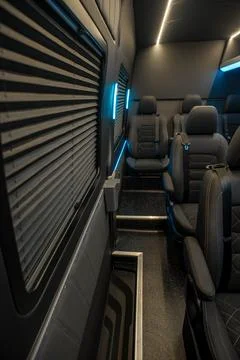 Comfortable interior of a passenger bus with soft seats Stock Photos