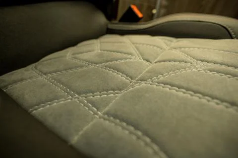 Comfortable interior of a passenger bus with soft seats Stock Photos