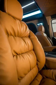 Comfortable interior of a passenger bus with soft seats Stock-Fotos
