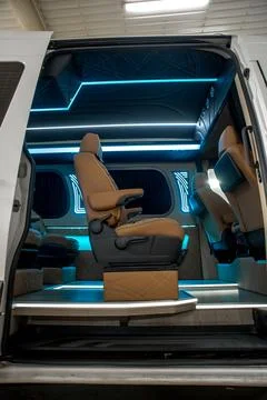 Comfortable interior of a passenger bus with soft seats Stock-Fotos