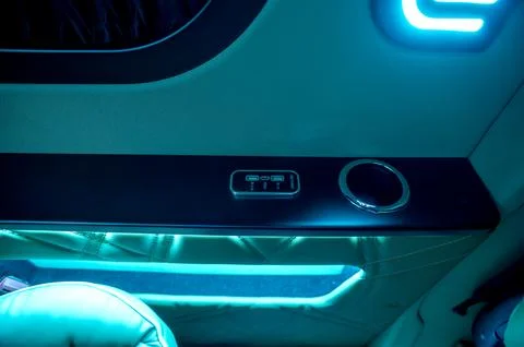Comfortable interior of a passenger bus with soft seats Stock Photos