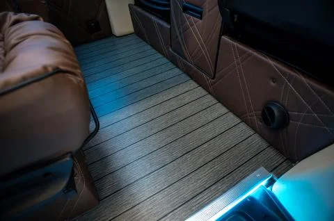 Comfortable interior of a passenger bus with soft seats Stock Photos