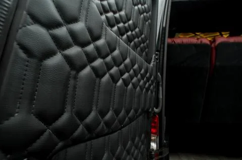 Comfortable interior of a passenger bus with soft seats Stock-Fotos