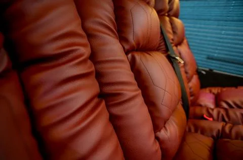 Comfortable interior of a passenger bus with soft seats Stock Photos