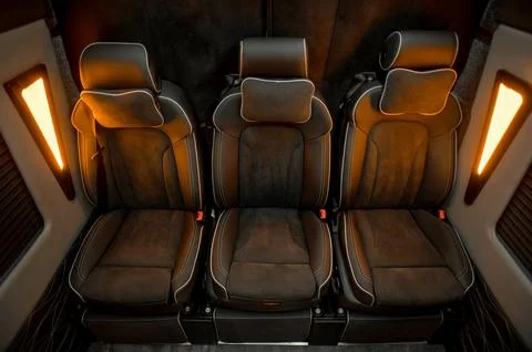 Comfortable interior of a passenger bus with soft seats Stock-Fotos