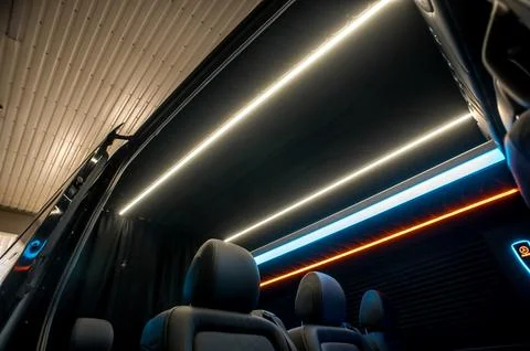 Comfortable interior of a passenger bus with soft seats Stock-Fotos