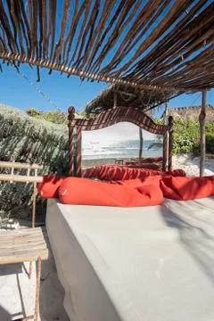 Comfortable king size bed on the beach Fotos de archivo