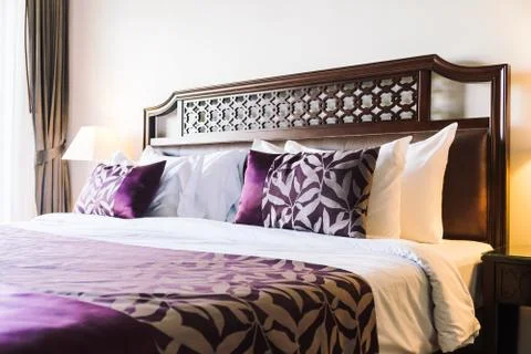 Comfortable pillow on bed Stock Photos